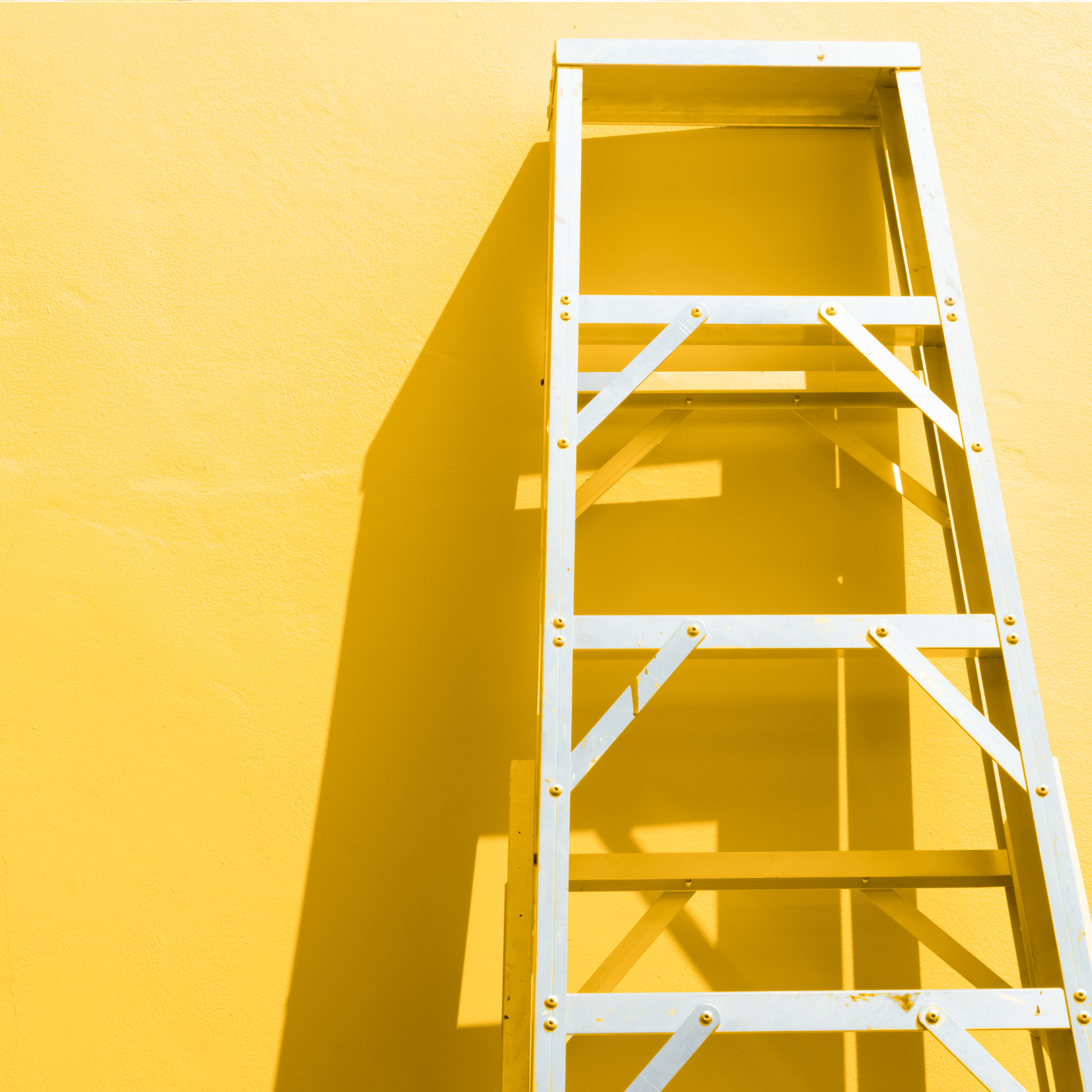 Ladder on yellow background Depicting Eating Disorder for Van Dusen Nutrition