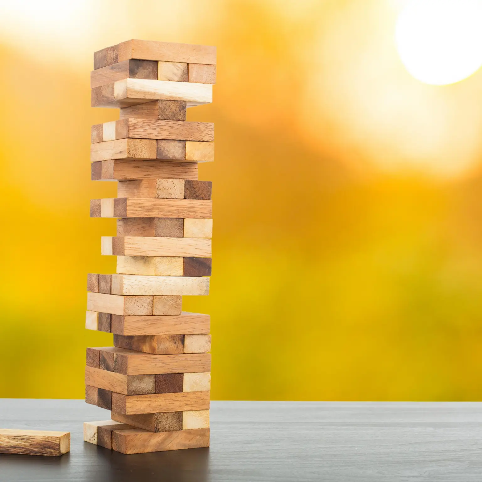 Jenga on Yellow Background Weight & Body Concerns