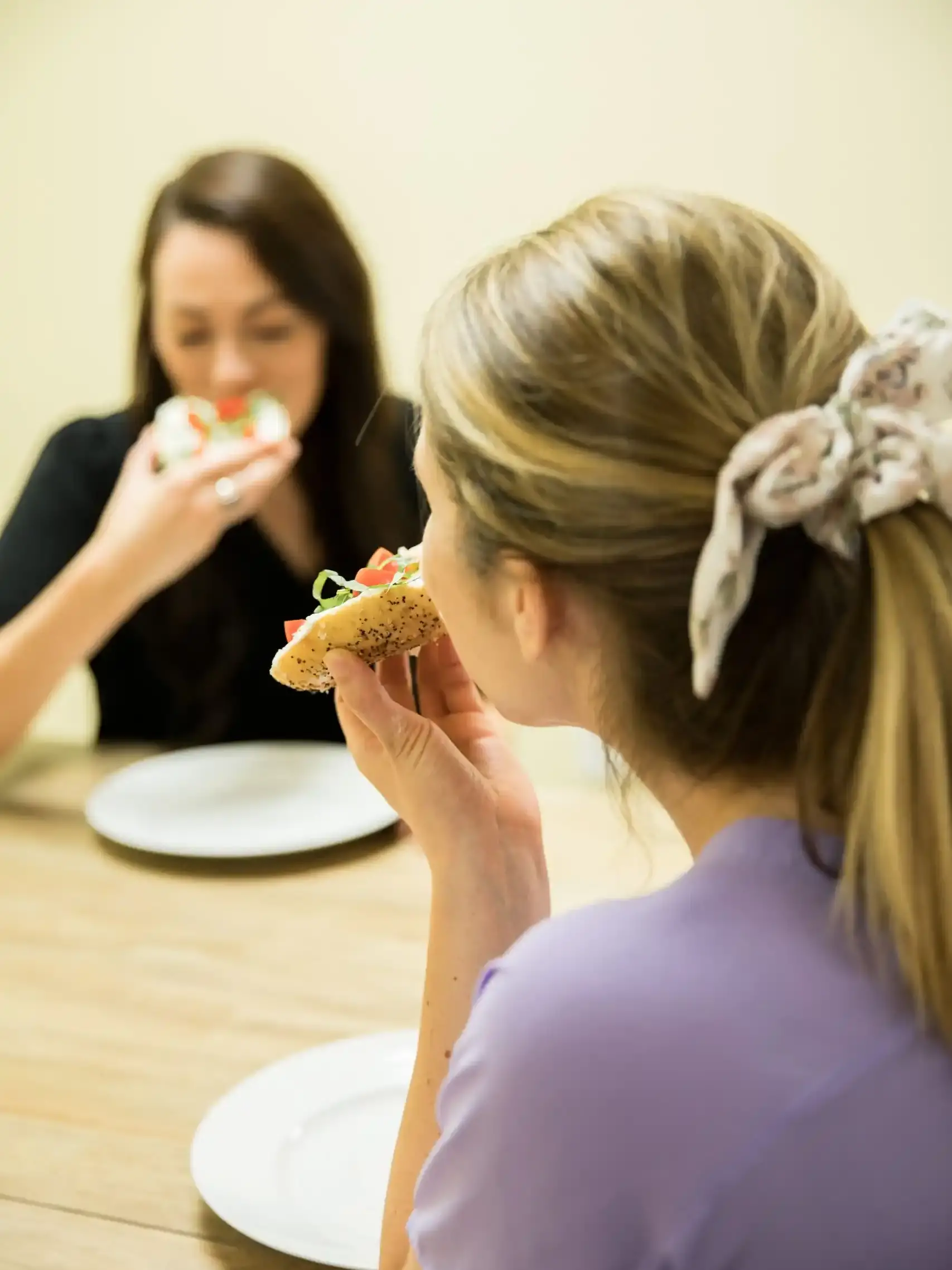 Staff and client eating together at VDN